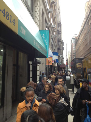  the line seemed to swell greater as the lunchtime rush pilled onto West 36th Street.  