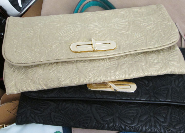 Accessories spotted at the sale including the Butterfly Leather Quilt Clutch