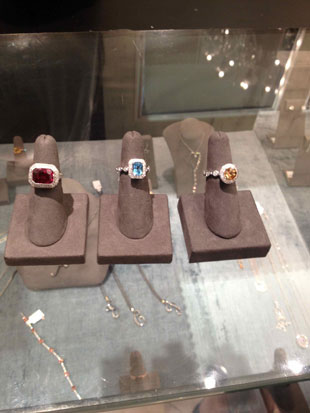 Michael C. Fina pink ruby and diamonds with gold ring ($2,268, orig. $5,670), blue topaz with white diamonds ring ($2,040, orig. $5,100), and the yellow topaz with diamonds gold ring ($3,828, orig. $6,380)